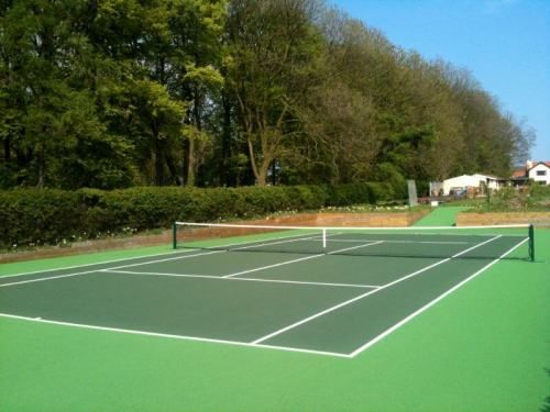 Resurfacing a Tennis Court Requires a Combination of Different Methods